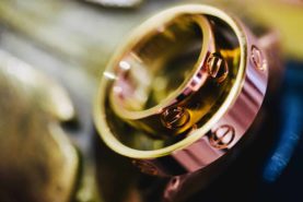 A close up of a gold ring.